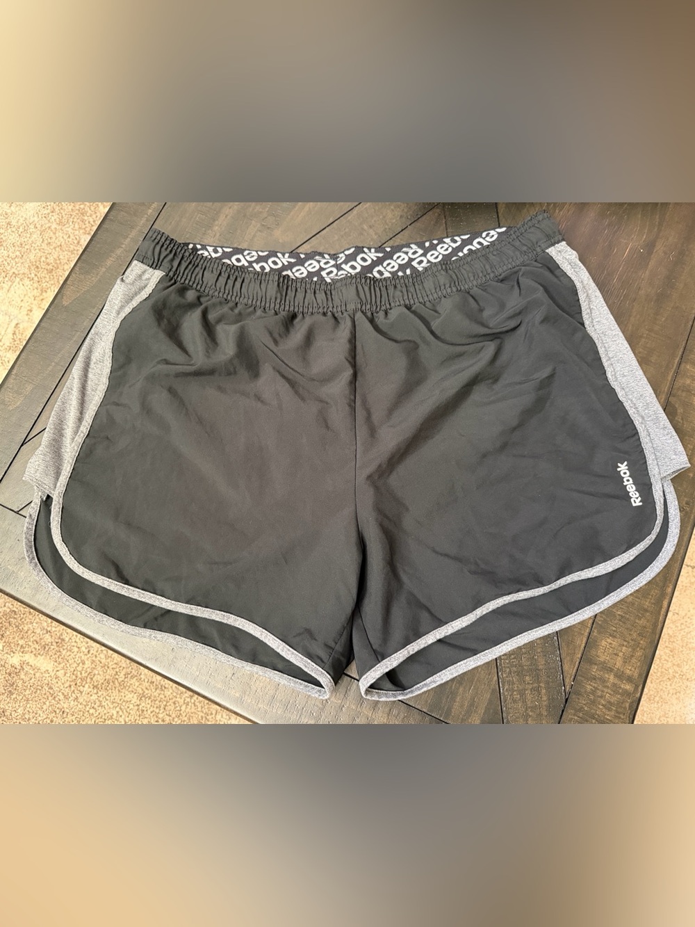 Reebok Black Athletic Shorts with Gray Trim and Logo Waistband
